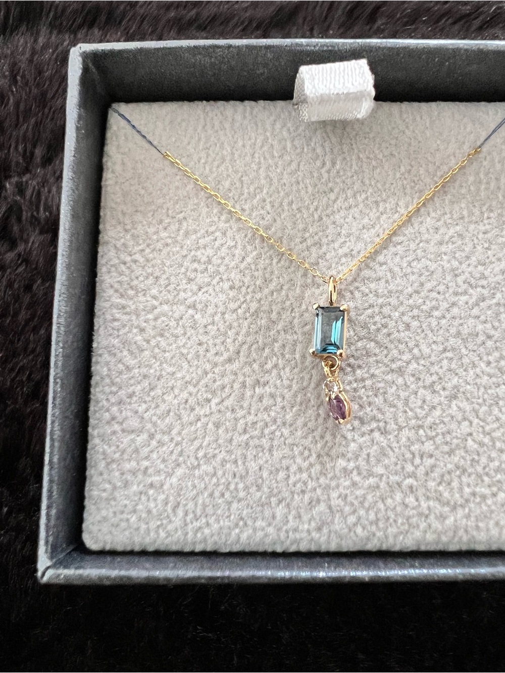 Gold Necklace with Blue Emerald-Cut Center and Pink Accent Drop